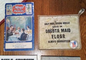 3-Collectible Books and a Dakota Maid Flour Pot Holder used as a Pin Cushion with an Old Patriotic Button