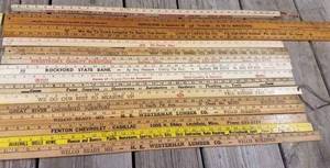Collection of about 40 Wooden Yard Sticks from Local, Regional and National Businesses in Varied Conditions
