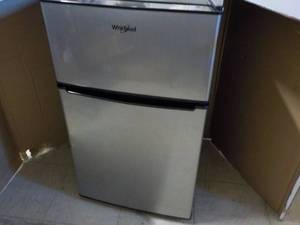 lot 1 image: Whirlpool 3.1 Cu Ft Stainless Steel...