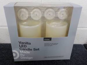 lot 56 image: Vanilla LED Candle Set made by Des...