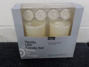 lot 57 image: Vanilla LED Candle Set made by Des...