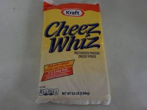 lot 176 image: 6.5 lb. pkg Kraft Cheez Whiz needs...