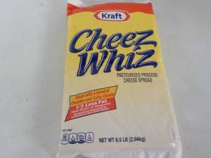lot 178 image: 6.5 lb. pkg Kraft Cheez Whiz needs...