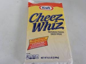 lot 179 image: 6.5 lb. pkg Kraft Cheez Whiz needs...