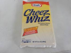lot 180 image: 6.5 lb. pkg Kraft Cheez Whiz needs...