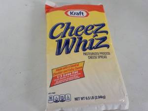 lot 183 image: 6.5 lb. pkg Kraft Cheez Whiz needs...