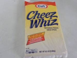 lot 184 image: 6.5 lb. pkg Kraft Cheez Whiz needs...