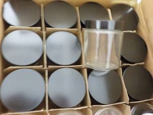 lot 294 image: 12 - 4 oz Glass Jars with Covers...
