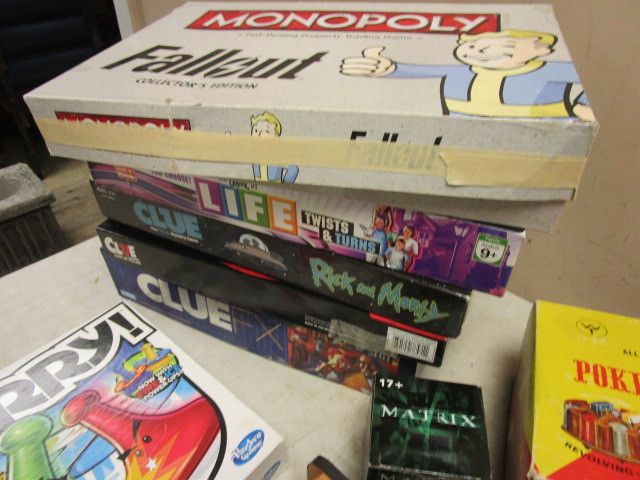 lot 226 image: MINI-FOOSBALL TABLE, CLASSIC BOARD GAMES, PUZZLES, POKER CHIPS, LIFE, MONOPOLY, CLUE, SORRY, MORE
