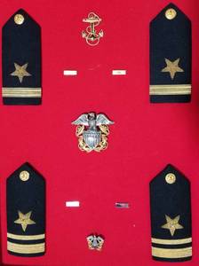lot 524 image: US Navy Officer Emblems and Seachest Yearbook