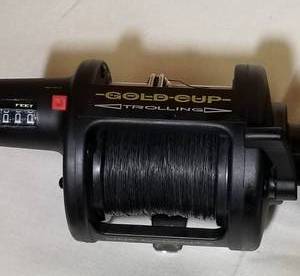 lot 433 image: Gold Cup Trolling Reel and Garcia Mitchell 300 Reel