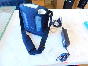 lot 2 image: OxyGo Portable Oxygen Concentrator