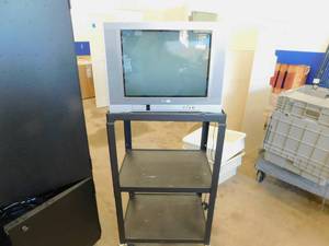 lot 47 image: Toshiba TV & Moveable Cart