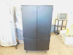 lot 51 image: Tall Black Cabinet w TV