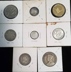 GROUP OF 8 FOREIGN COINS AS PICTURED - MOSTLY SILVER