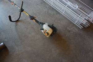 lot 18 image: Ryobi 31 CC 18 Gas Weed Trimmer
