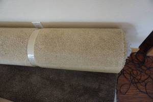lot 38 image: 1 Roll of Tan Colored Carpeting