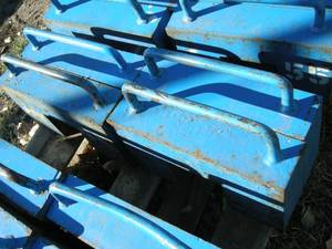 lot 9 image: Four 55lb Tractor Weights