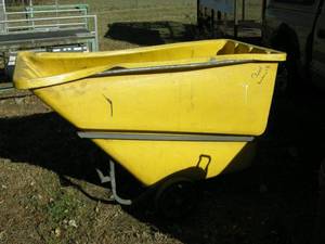 lot 31 image: Rubbermaid Commercial Rolling Cart