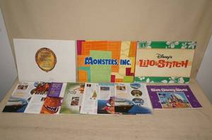 lot 34 image: Disney Prints and Vacation Items