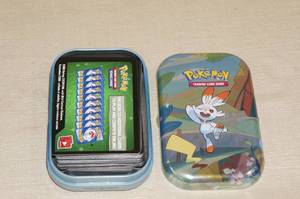 lot 60 image: Small Metal Pokemon Case - Digital Game Codes
