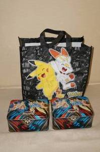 lot 62 image: Pokemon Tote Bag with Lunchboxes, Novelites