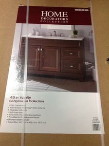 lot 23 image: Home Decorators Sedgewood 48-12 in. W Bath Vanity in Dark Cognac with Solid Surface Technology Vanity Top in Arctic with White Sink not used