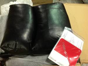 lot 34 image: Relax a Lounger Preston Faux Leather Recliner Chair in Black not used