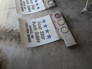 lot 28 image: Truck Mud Flaps & Light Bar