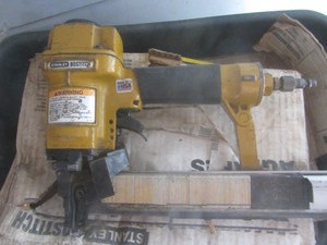 Bostitch stapler, tote with nails...