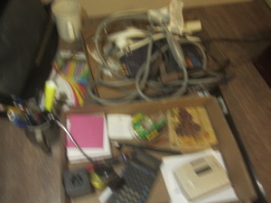 Office supplies with pencils, clipo...