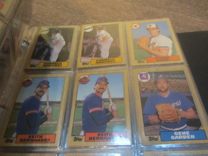 Baseball cards in a four inch 3-rin...