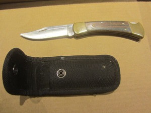 Buck 110E folding knife...
