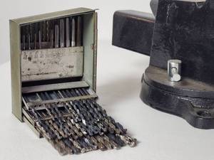 lot 11 image: Bench Vise, Oil Can and Drill Bits & Taps