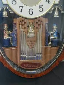 lot 63 image: Retired Piece Small World Rhythm Clock with Dual Organ Players