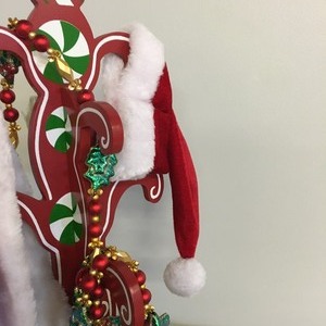 lot 198 image: Santa Coat Rack and Garland