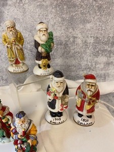 lot 98 image: Six Ceramic Santas