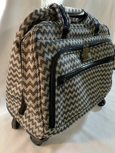 lot 162 image: Nicole Miller Rolling Luggage
