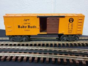 lot 49 image: Lionel O Baby Ruth Box Car #X2454