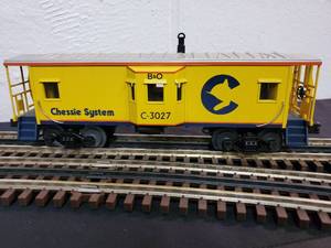 lot 55 image: Rail King O Scale 3-Rail Chessie System Bay Window Caboose 30-7713