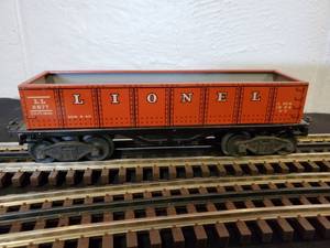 lot 102 image: Early Lionel O Tin Gondola Car Part No. 2677