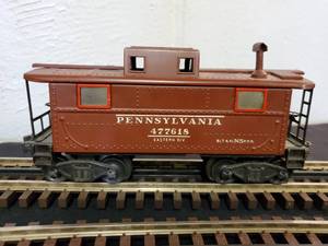 lot 117 image: Lionel O 3-Rail Pennsylvania Caboose Part No. 2757