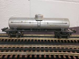 lot 87 image: Lionel O Silver tin Tanker Car Part No.955-6