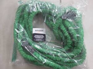 lot 213 image: Green Hose...