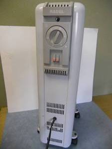 lot 6 image: Radel Radiant heat oil-filled heater tower with wheels