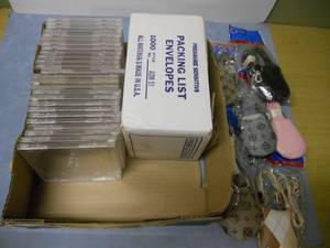 lot 53 image: CDDVD Cases, Packing Slip Envelopes and New Cell Phone Purses