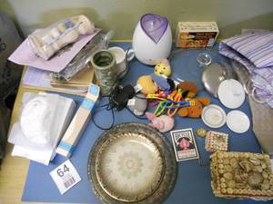 lot 64 image: Essential Oil Diffuser, Tiki Cup, Can opener, McDonalds toys and more