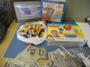 lot 68 image: Toys Play-Doh Kit, Jenga sets, Collectible Goldilocks Book, Etc