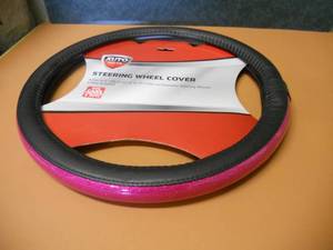 lot 79 image: Pink Glitter Steering Wheel Cover - New