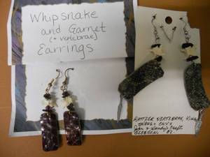 lot 80 image: Snakeskin and Vertabrae Earrings